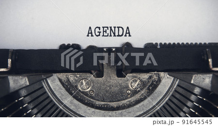 Agenda text typed on an old vintage typewriter. Conceptual 91645545