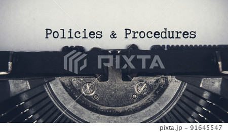Policies and procedures text typed on an old vintage typewriter. Rules concept Policies and procedures text typed on an old vintage typewriter. Rules concept 91645547