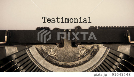 Testimonial text typed on an old vintage typewriter. Conceptual Testimonial text typed on an old vintage typewriter. Conceptual 91645548