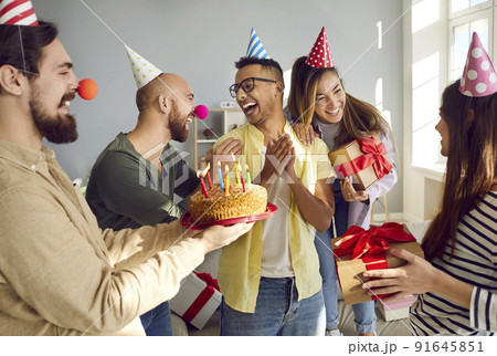Happy diverse people greeting friend with birthday Happy diverse people greeting friend with birthday 91645851