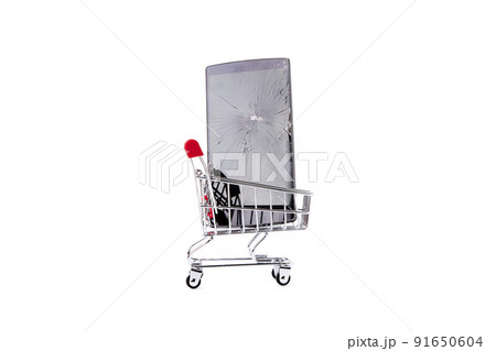 Mobile with broken screen inside a shopping cart. Safety concept 91650604