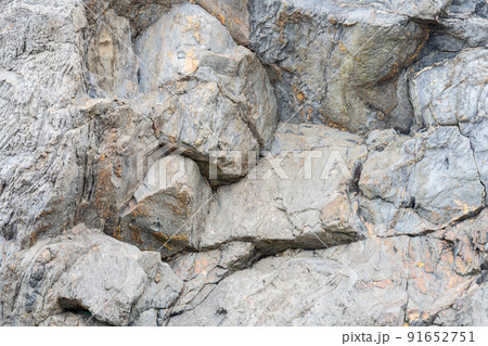 Geological rock layers.Close-up abstract shot of the rock face Geological rock layers.Close-up abstract shot of the rock face 91652751