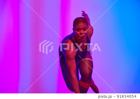 Body positive, slimming. African american woman in sportswear workout, fashion studio shot. Advertising photo, copyspace Body positive, slimming. African american woman in sportswear workout, fashion studio shot. Advertising photo, copyspace 91654054