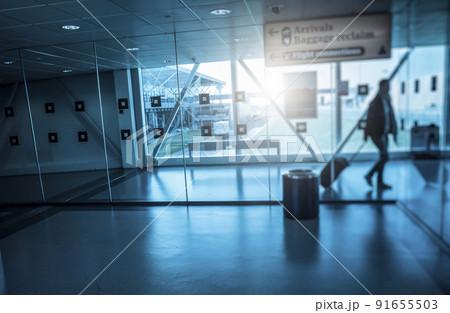 People walking at airport in the lounge 91655503