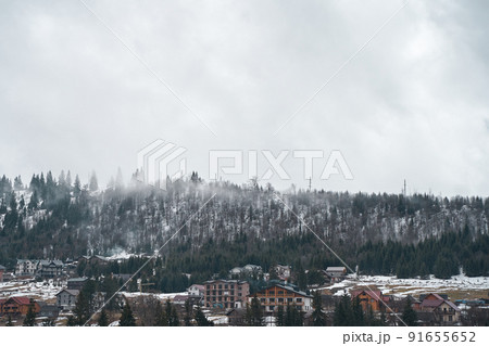 Ukrainian karpaty mountains winter landscape. Village among mountains 91655652