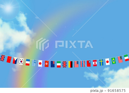 雨上がりの空に広がる万国旗と虹　 91658575