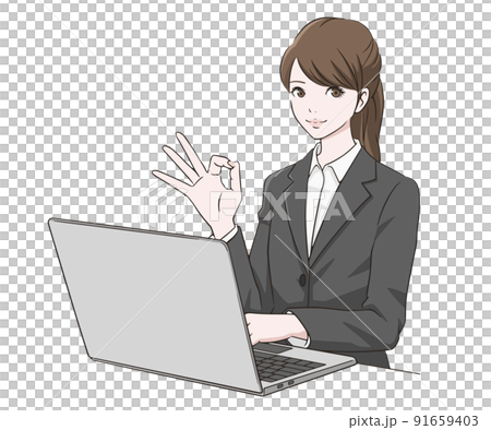 一個穿著西裝的女人在電腦前做一個 OK 標記 91659403