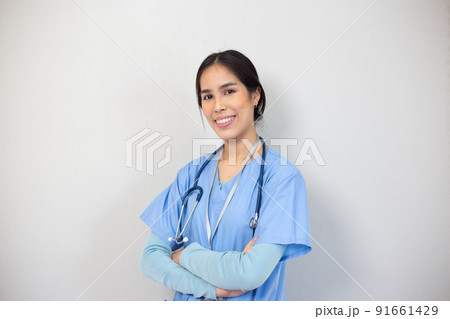 Portrait of young asian nurse in the white room, healthcare workers concept. 91661429