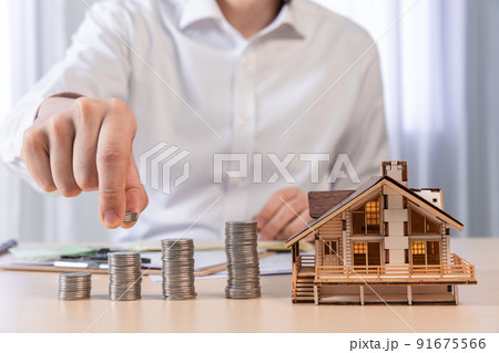 real estate contract hand motion_stacking coins real estate contract hand motion_stacking coins 91675566