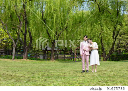 Korean Asian couple self small wedding concept in spring 91675786