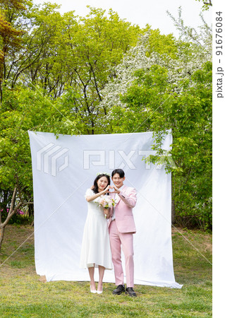 Korean Asian couple self small wedding concept in spring 91676084