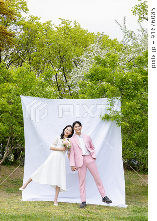 Korean Asian couple self small wedding concept in spring 91676085
