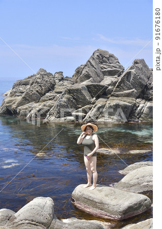 夏の北海道せたな町の海岸で女性のポートレートを撮影 91676180