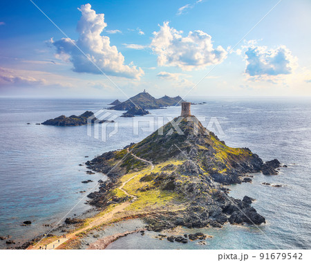 Popular tourist destination Torra di a Parata with Genoese Tower and Archipelago of Sanguinaires Popular tourist destination Torra di a Parata with Genoese Tower and Archipelago of Sanguinaires 91679542