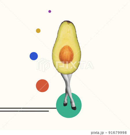 Composition with huge ripe avocado on female legs isolated over light background. Healthy eating, eco products, vitamins concept. Contemporary art collage 91679998