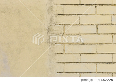Yellow color retro brick wall old masonry texture and cement concrete background surface 91682220