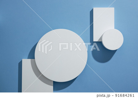 Top view of circle , square white podium ,  in blue background and blank space for advertising , abstract content   91684261