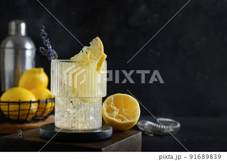 Summer lavender lemonade with lemon in glasses for party. Summer lavender lemonade with lemon in glasses for party. 91689839