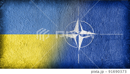 Ukrainian and NATO flag on concrete 91690373