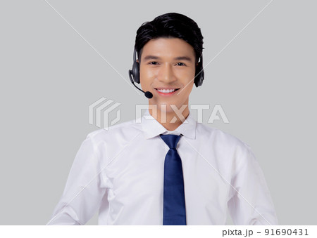 Portrait young asian business man call center wearing headset isolated on white background. 91690431