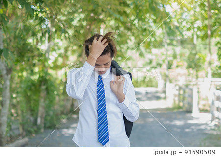 After work. Business Asian man holding shirt suit enjoys the atmosphere view and using ideas After work. Business Asian man holding shirt suit enjoys the atmosphere view and using ideas 91690509