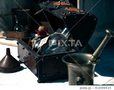 small trunk with bottles of oil or particular essences inside 91699435