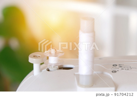 Winding threads on a bobbin on sewing machine. 91704212
