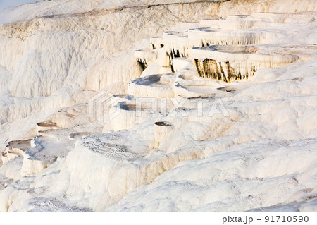 Natural travertine pools and terraces in Pamukkale Natural travertine pools and terraces in Pamukkale 91710590