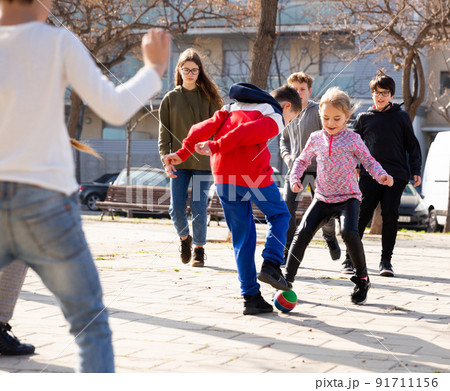 Children playing soccer with ball Children playing soccer with ball 91711156