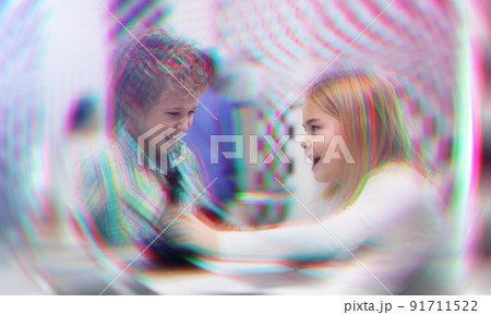 Tweens trying to get out of escape room, toned image with circular blur 91711522