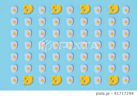 Toys in the form of food hand made of felt on blue background. Hand sewing. Minimal artistic food concept. Toys in the form of food hand made of felt on blue background. Hand sewing. Minimal artistic food concept. 91717299