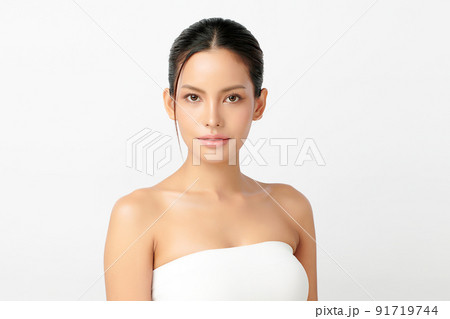 Beautiful young asian woman with clean fresh skin on white background, Face care, Facial treatment, Cosmetology, beauty and spa, Asian women portrait. Beautiful young asian woman with clean fresh skin on white background, Face care, Facial treatment, Cosmetology, beauty and spa, Asian women portrait. 91719744