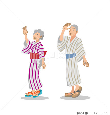 浴衣を着て盆踊りを楽しむ老夫婦 91722082