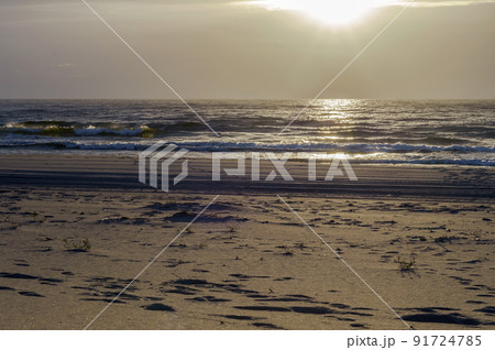 Sunset over the sea. Reflection of sunlight in the sea waves. The sky in the sunset rays. Baltic Sea. Sunset over the sea. Reflection of sunlight in the sea waves. The sky in the sunset rays. Baltic Sea. 91724785