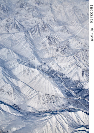 Mountain landscape, view from an airplane, Snowy panorama Mountain landscape, view from an airplane, Snowy panorama 91730691