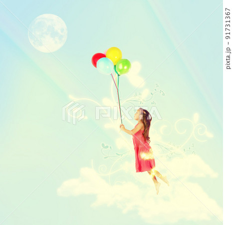 Floating away. A young girl being lifted in the air by a bunch of colorful balloons. 91731367