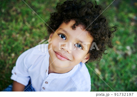 All ready for my first day. Shot of a little boy smiling in nature. All ready for my first day. Shot of a little boy smiling in nature. 91732197
