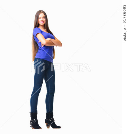 Confidence from head to toe. Studio portrait of a beautiful and confident young woman posing against a white background. Confidence from head to toe. Studio portrait of a beautiful and confident young woman posing against a white background. 91736095