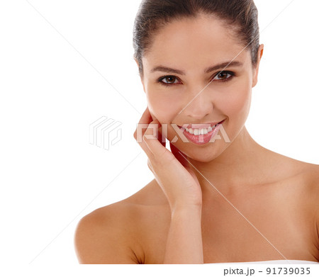 Beauty catches the eyes. Portrait of a beautiful young woman standing in a studio. 91739035