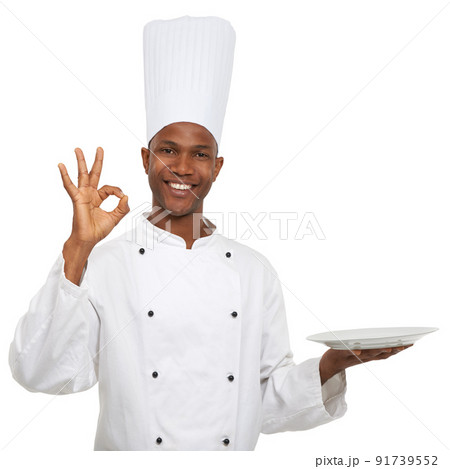 His dishes are always perfect. Portrait of an african chef signaling perfect with his hands. 91739552
