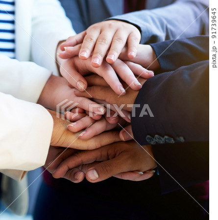 We are one. Cropped shot of a group of unrecognizable peoples hands. 91739645