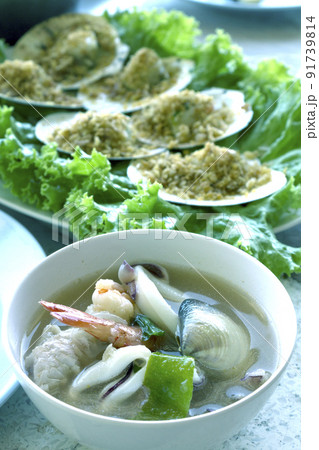 Tom Yum Seafood and Baked Scallops with Garlic Butter that Thai food or Seafood cuisine are most popular in Thailand. 91739814
