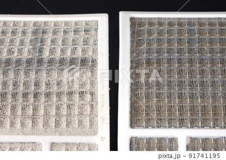 Dirty and clean air conditioner filters. Cleaning the filter from dust, allergies and asthma from dust, maintenance of air conditioners 91741195