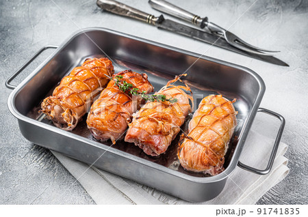 Baked Chicken breasts stuffed with cheese and bacon. White background. Top view Baked Chicken breasts stuffed with cheese and bacon. White background. Top view 91741835