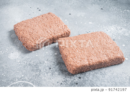 Raw plant based meat, food reduce carbon footprint. Gray background. Top view 91742197