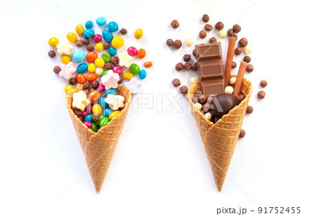 Ice cream waffle cones with candy isolated on white background 91752455