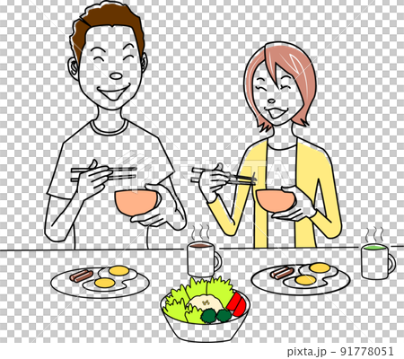 A couple talking while eating breakfast 91778051