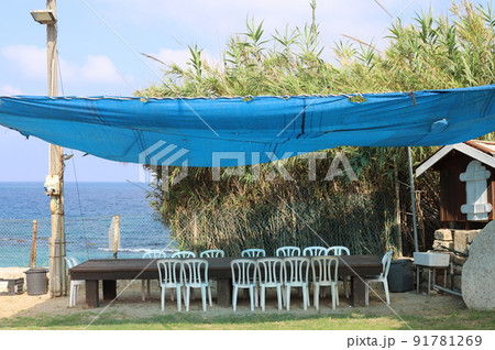Canopy from the scorching sun on the shores of the Mediterranean Sea in northern Israel Canopy from the scorching sun on the shores of the Mediterranean Sea in northern Israel 91781269