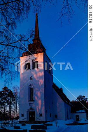 Beautiful white church of Valkeala in winter sunset, Kouvola, Finland Beautiful white church of Valkeala in winter sunset, Kouvola, Finland 91785430