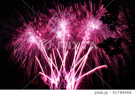 Colorful fireworks lights on the sky background at night Colorful fireworks lights on the sky background at night 91788466